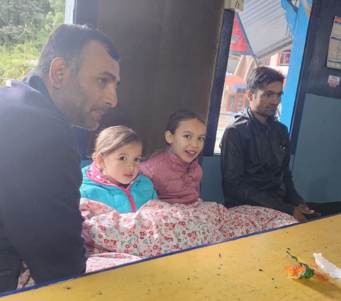 family trekking in nepal